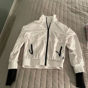 P’tula white jacket with black detailing.